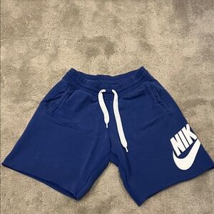 Nike Men's Athletic Shorts in Blue with White Nike logo